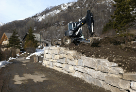 Travaux d'enrochement pelle araignée