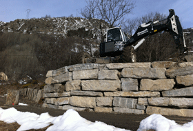 Travaux d'enrochement pelle araignée